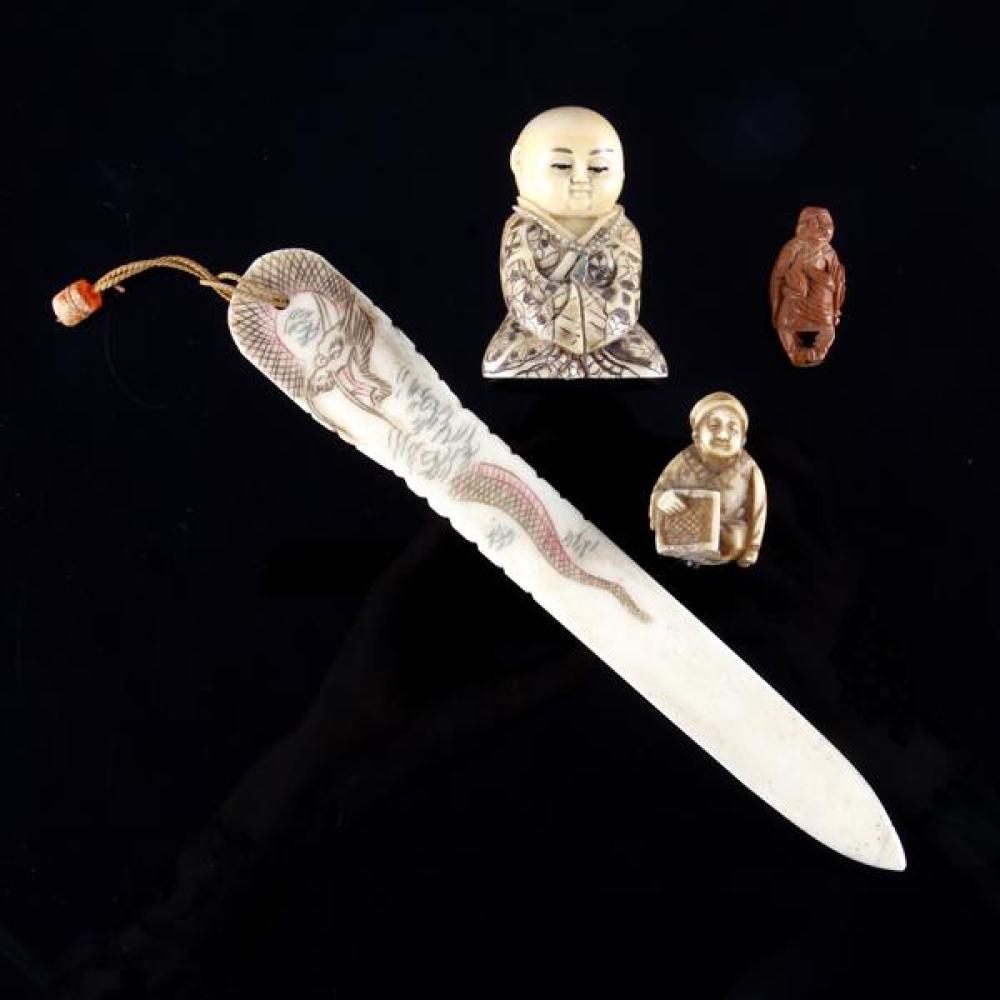 Appraisal: JAPANESE NETSUKE CHINESE SCRIMSHAW CARVED PAGE TURNER AND FIGURAL PEACH