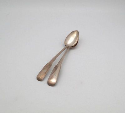 Appraisal: Two similar George III Irish silver fiddle pattern basting spoons