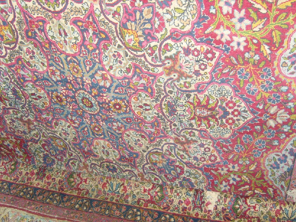 Appraisal: A wool carpet in the Persian style with white ground