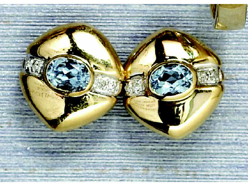 Appraisal: BLUE TOPAZ EARRINGS k yellow gold pierced earrings with clip