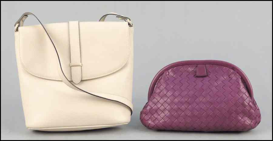 Appraisal: BOTTEGA VENETA WOVEN PURPLE LEATHER CLUTCH HANDBAG With a retractable