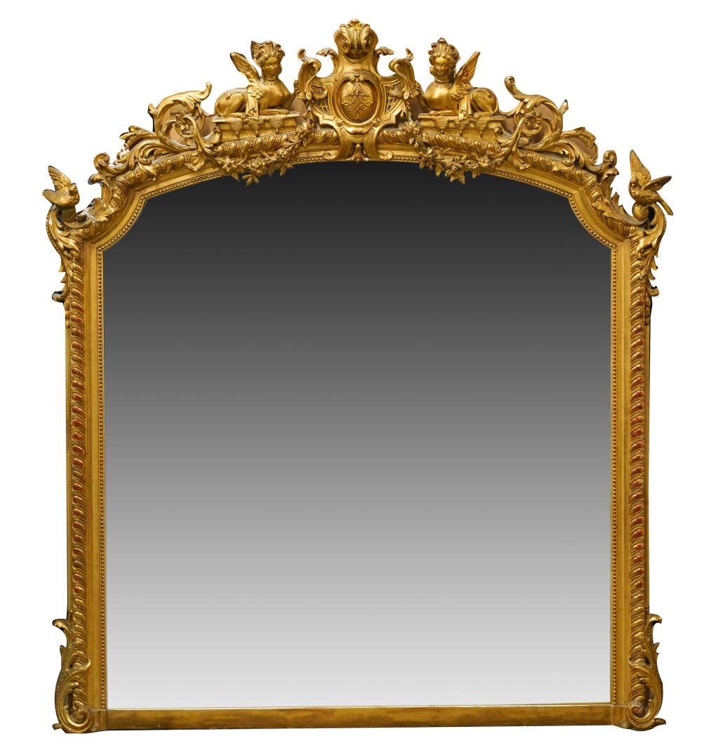 Appraisal: ROCOCO-STYLE GILTWOOD GESSO WALL MIRRORcrested with two sphinxes flanking a