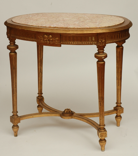 Appraisal: A FRENCH GILT WOOD MARBLE INSET SALON TABLE cm x