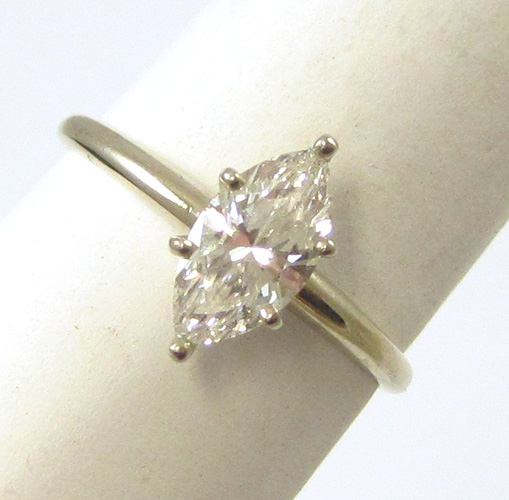 Appraisal: DIAMOND AND FOURTEEN KARAT GOLD SOLITAIRE RING the -prong setting