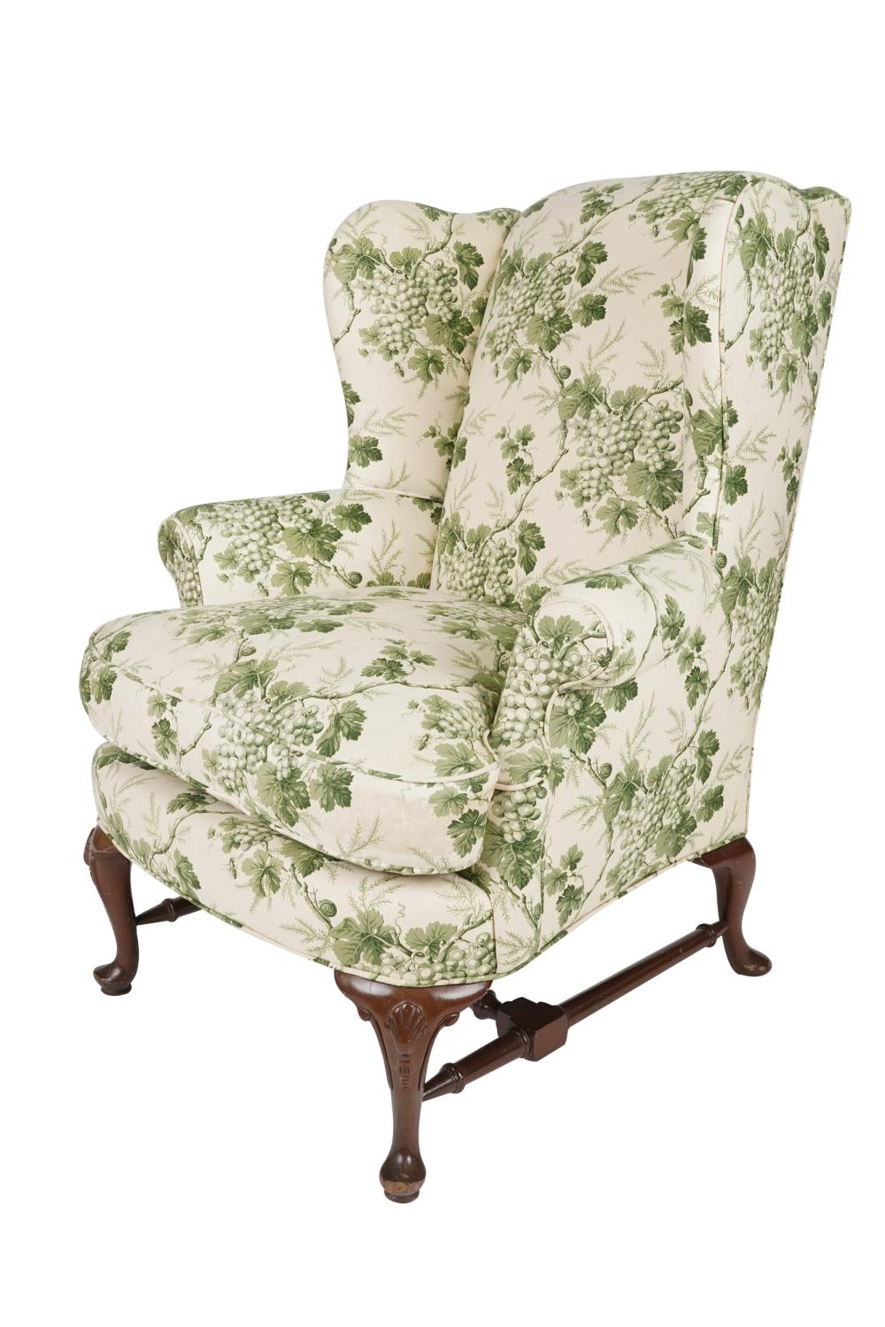 Appraisal: GREEN WHITE UPHOLSTERED WING CHAIRwith loose seat cushion Condition stains