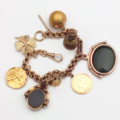 Appraisal: EDMOND HENRI BECKER Etc Charm bracelet in k gold with