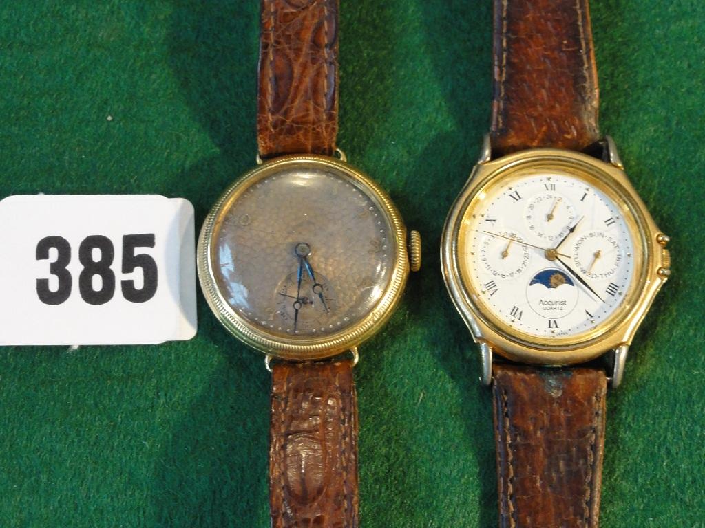 Appraisal: A gentleman's gold wrist watch with leather strap marked together