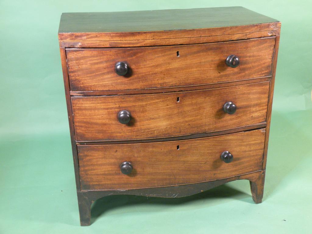 Appraisal: An early thC mahogany and ebony strung bow fronted chest