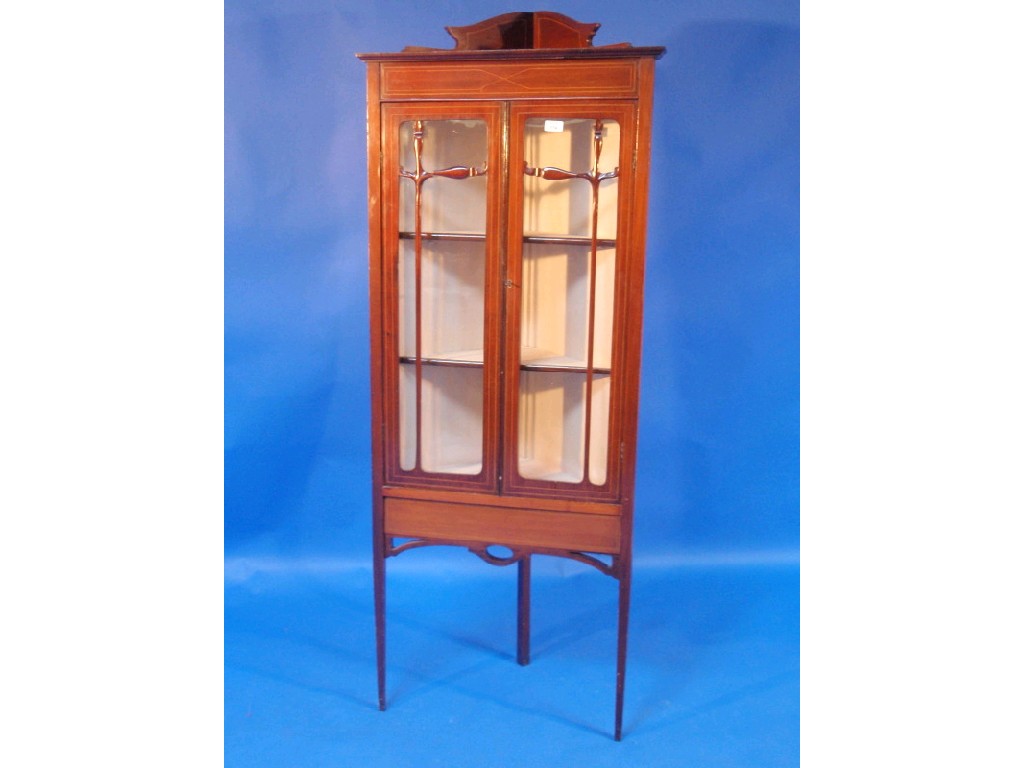 Appraisal: A Sheraton revival standing corner display cabinet the inlaid mahogany