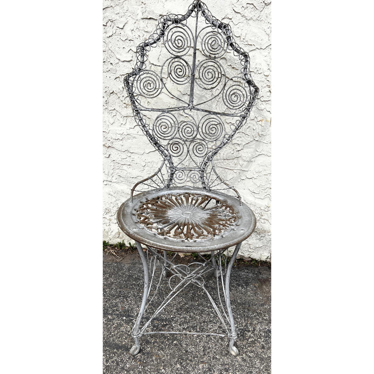 Appraisal: Victorian Iron and Wire garden chair Circa s Leaf design