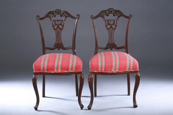 Appraisal: PAIR ROCOCO REVIVAL CARVED WALNUT SIDE CHAIRS th century with