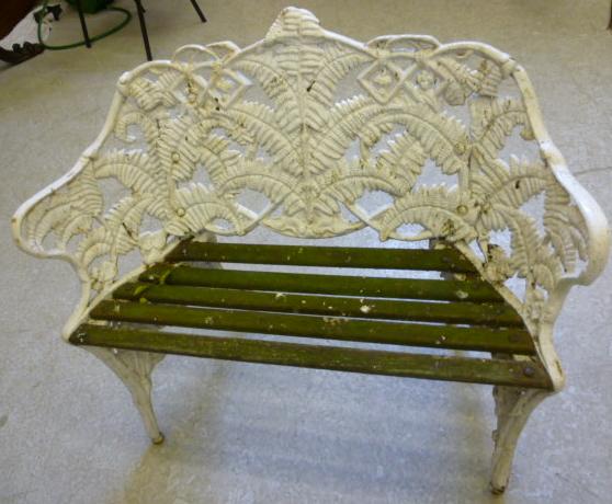 Appraisal: A CAST IRON GARDEN SEAT th century in fern and