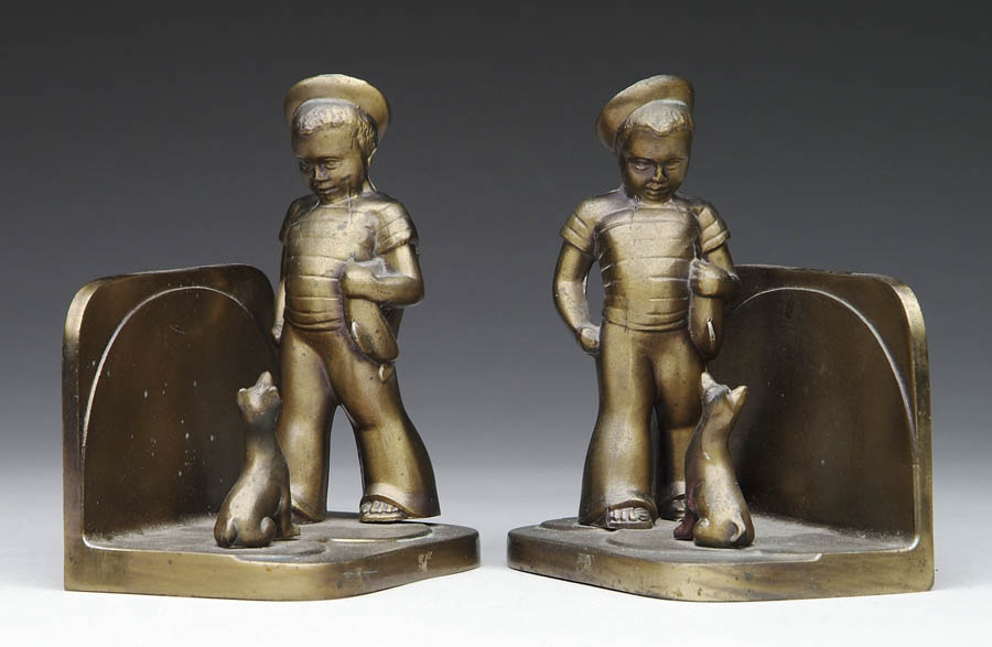 Appraisal: PAIR OF BRONZE PATINATED SAILOR BOY DOG BOOKENDS Marked on