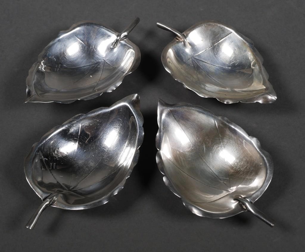 Appraisal: Set of four Cartier sterling silver footed leaf form candy