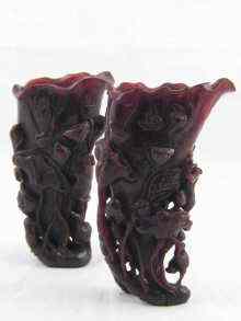 Appraisal: A pair of Chinese buffalo horn libation cups carved with