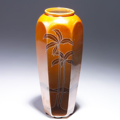 Appraisal: WELLER Marengo faceted vase decorated with palm trees on an