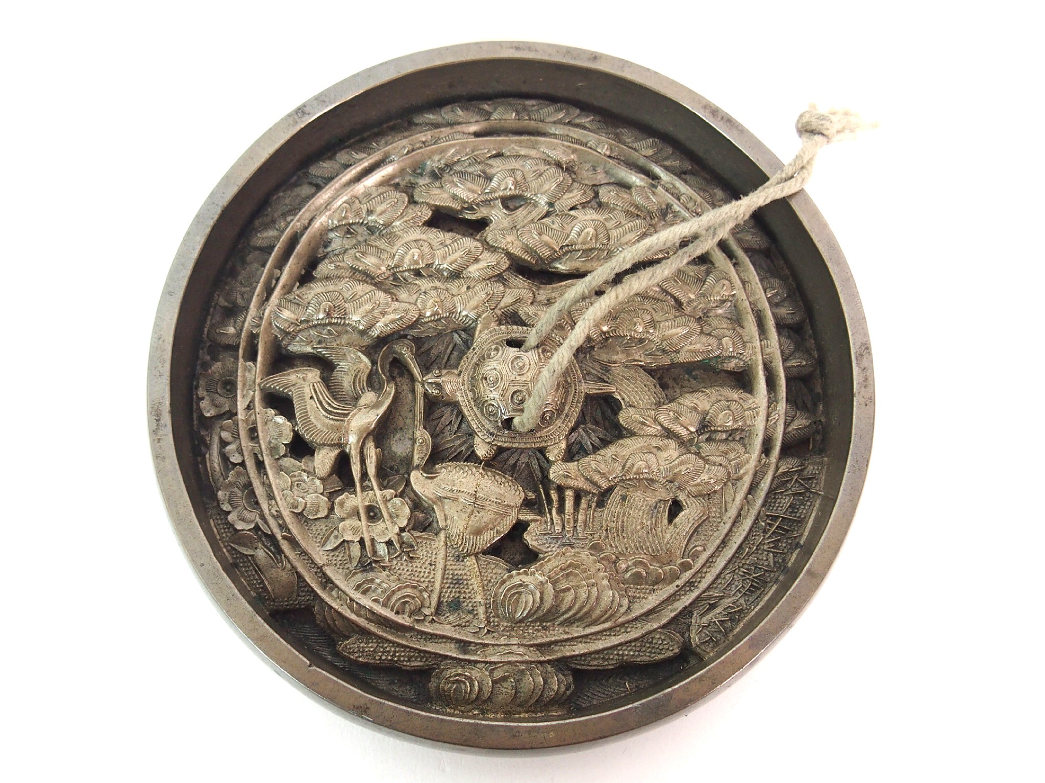 Appraisal: A Chinese polished bronze hand mirrorcast with turtle and herons