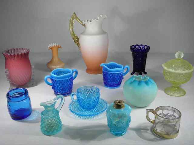 Appraisal: Fourteen pieces of assorted colored Victorian art glass Includes a