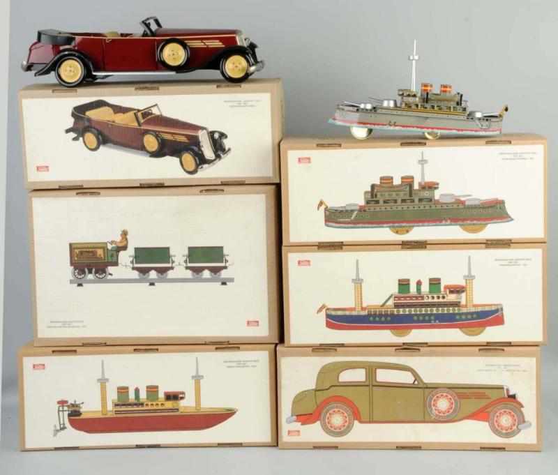 Appraisal: Lot of Contemporary Paya Vehicle Toys Description Larger size variations