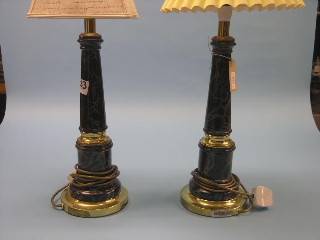 Appraisal: A pair of simulated marble table lamps with brass mounts