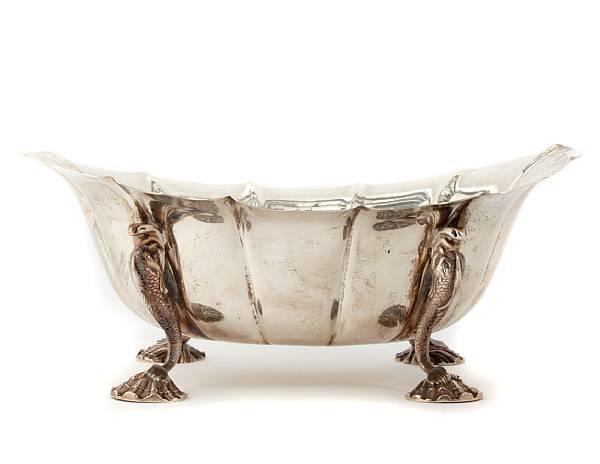 Appraisal: A silver centerpiece bowlBearing English Georgian hallmarksWith crest Fluted shaped