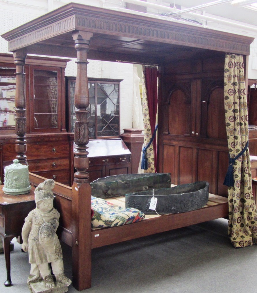 Appraisal: A th century carved oak four post bed with double