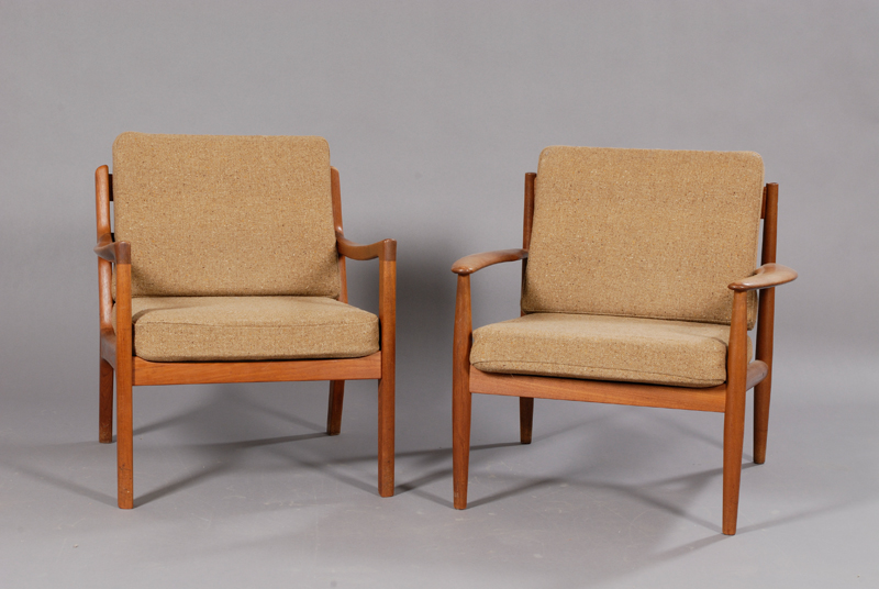 Appraisal: Two Danish Modern Lounge Chairs Teak and upholstery CADO Denmark