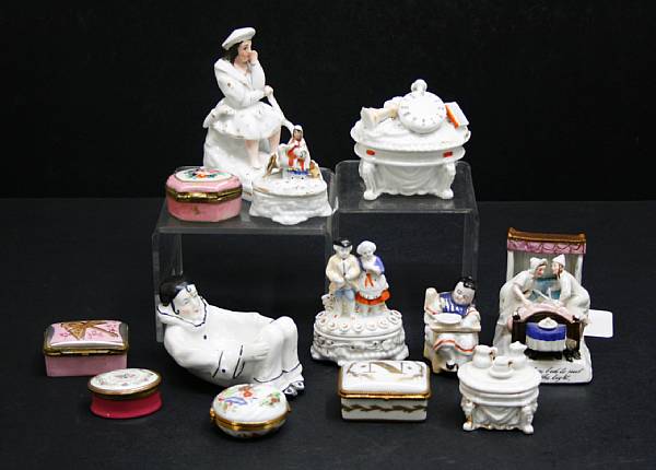 Appraisal: An assembled group of porcelain fairings and boxes th th