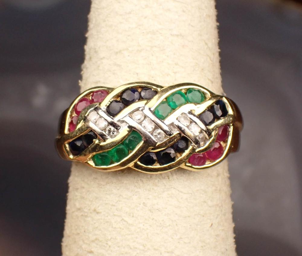 Appraisal: FOURTEEN KARAT GOLD RING WITH PRECIOUS GEMSTONES The yellow and