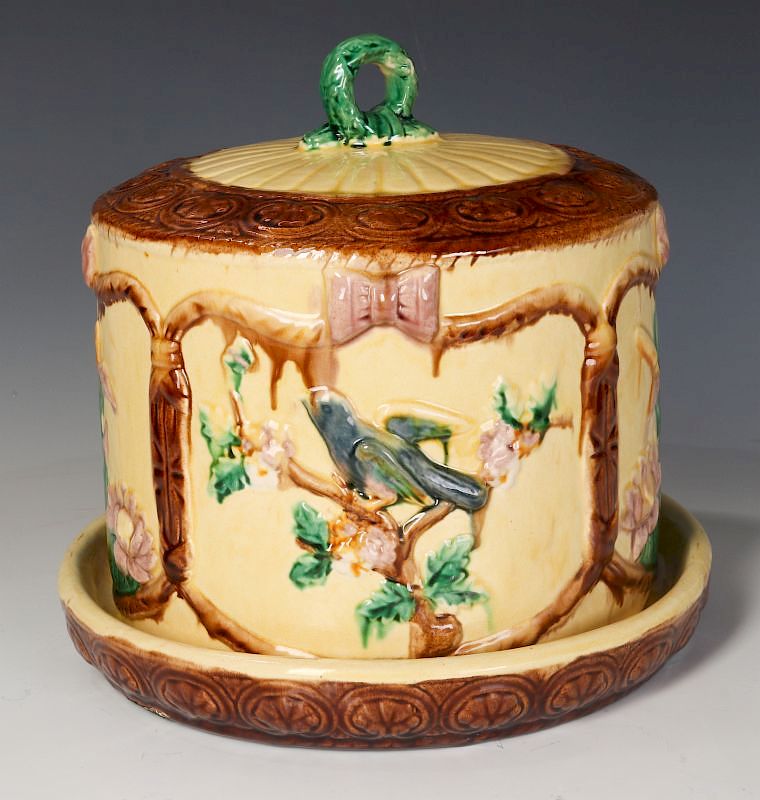 Appraisal: A TH C ENGLISH MAJOLICA POTTERY CHEESE KEEPER Decorated with