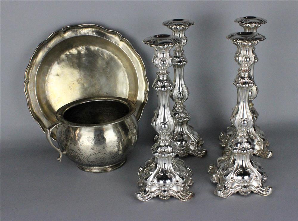 Appraisal: FOUR MERIDEN PLATED CANDLESTICKS in the Rococo style - h