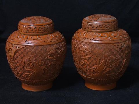 Appraisal: PAIR CHINESE CINNABAR LACQUER JARS AND COVERS Modern globular jars