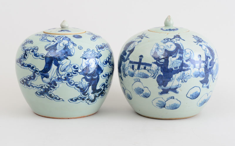 Appraisal: TWO SIMILAR CHINESE CELADON-GLAZED PORCELAIN GINGER JARS AND COVERS Each