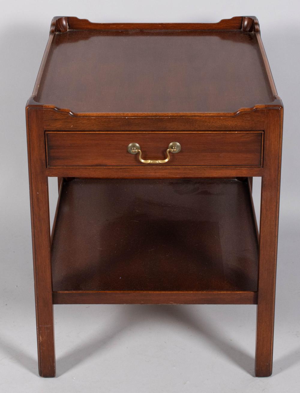 Appraisal: SOUTHAMPTON GEORGE III STYLE MAHOGANY SIDE TABLE the rectangular galleried