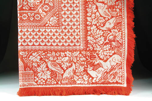 Appraisal: SUMMER WINTER RED AND WHITE COVERLET The jacquard coverlet has