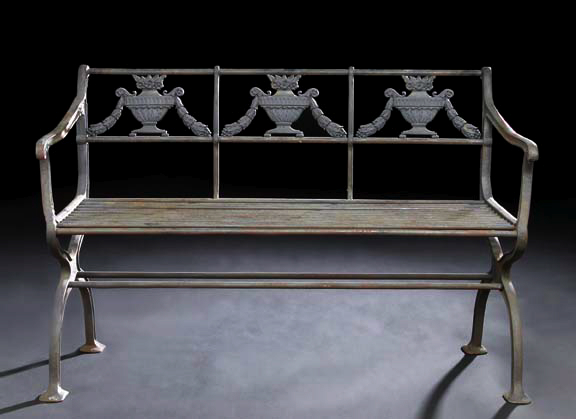 Appraisal: Neoclassical-Style Cast-Iron Garden Bench the back with urn-and-swag decor the