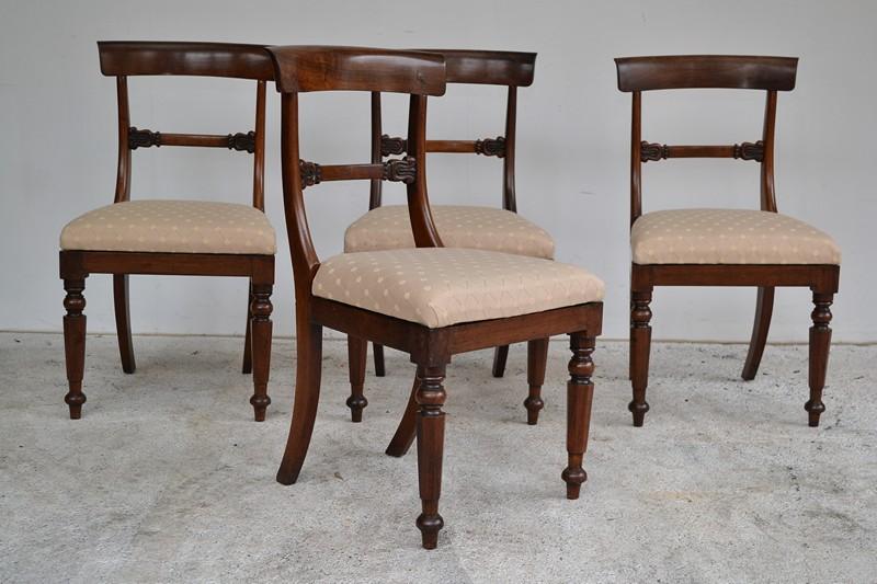 Appraisal: A SET OF FOUR WILLIAM IV ROSEWOOD SPADE BACK DINING