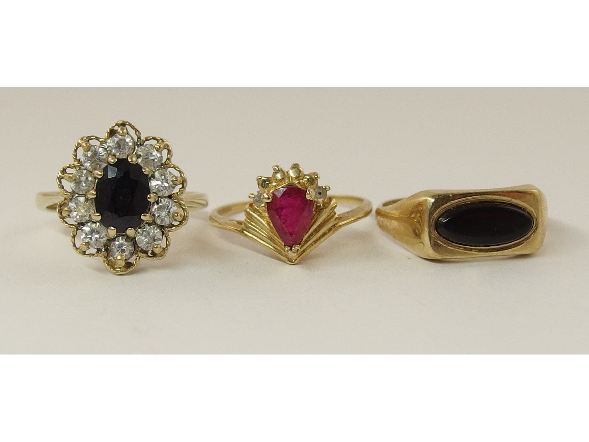 Appraisal: Three ct gem set rings to include ruby and diamond