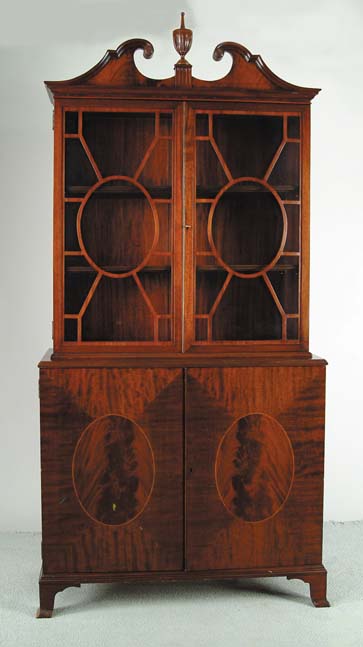 Appraisal: FINE MAHOGANY LINEN AND CHINA CLOSET In two part stepback