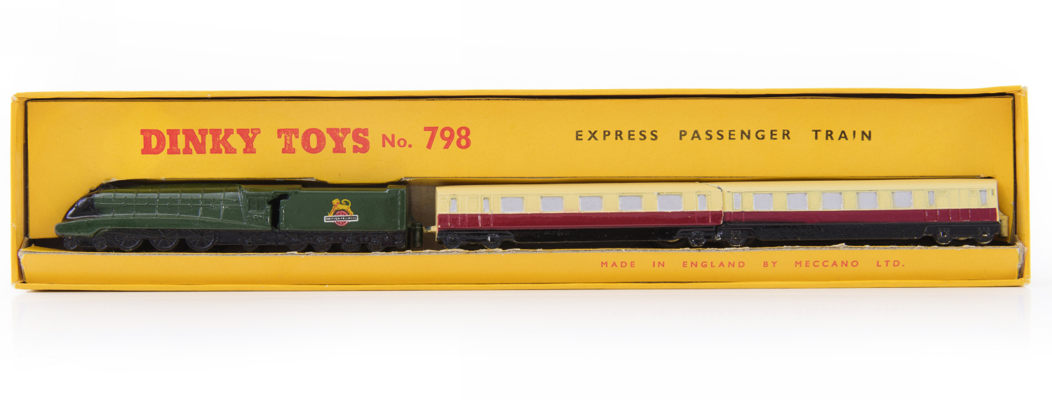 Appraisal: DINKY EXPRESS PASSENGER TRAIN X RED AND MAROON CARRIAGES WITH