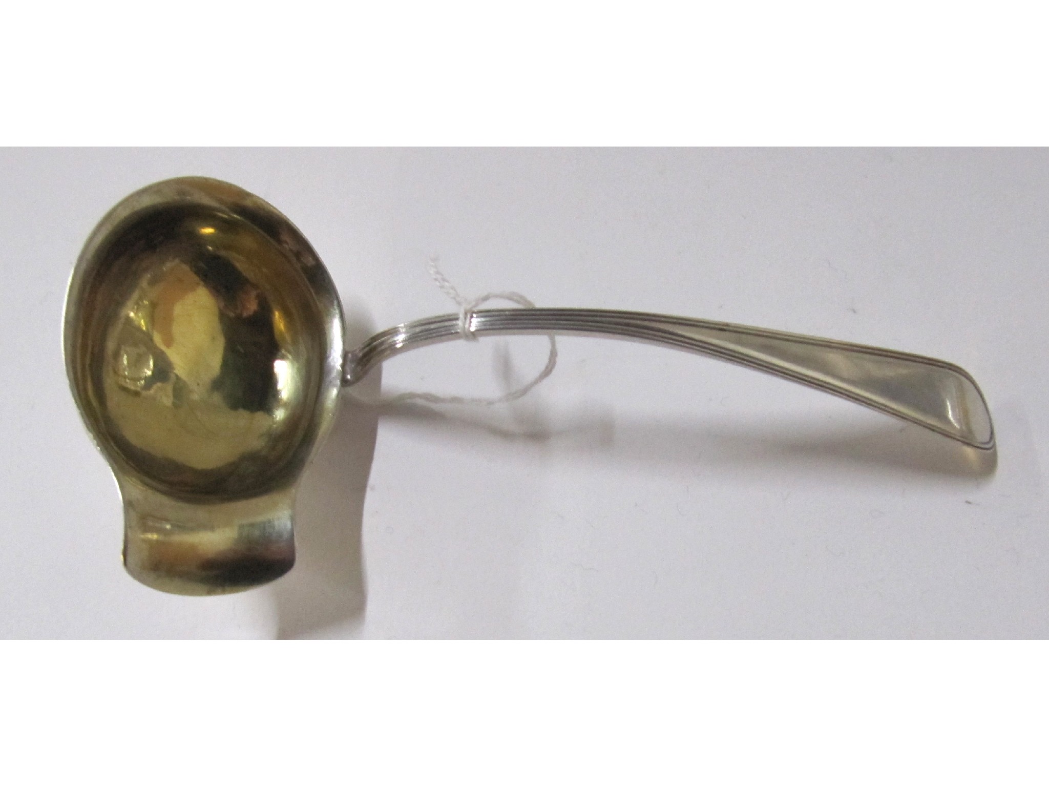 Appraisal: A continental silver toddy ladle