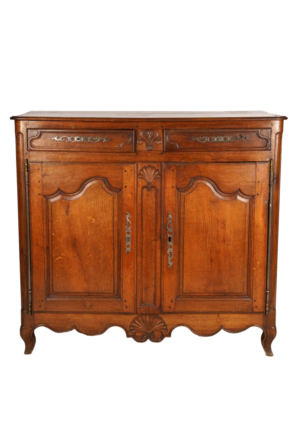 Appraisal: FRENCH PROVINCIAL WALNUT BUFFEThaving two short drawers over a pair