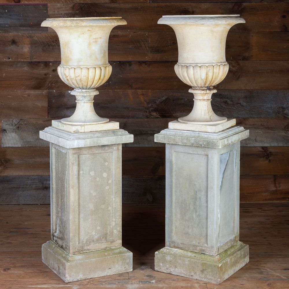 Appraisal: Pair of Cast Terracotta Campana Urns on Stone Pedestals x