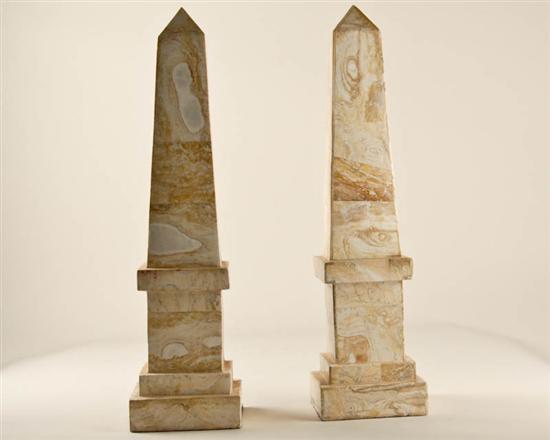 Appraisal: A Pair of Stone Clad Decorative Obelisks marble or travertine