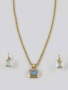 Appraisal: An aquamarine pendant set in yellow metal tests ct gold