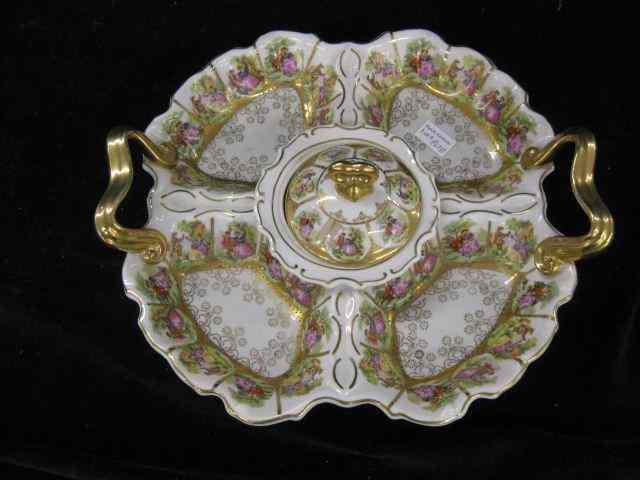 Appraisal: Fine Porcelain Serving Dish panels of courtingscenes gold trim four