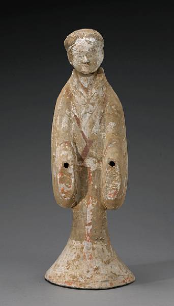 Appraisal: A painted pottery standing funerary figure Han Dynasty The slender