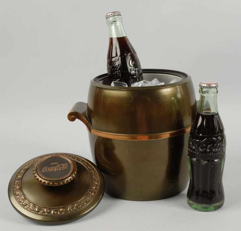 Appraisal: Bronze Colored Coca-Cola Ice Bucket Description s Complete with lid