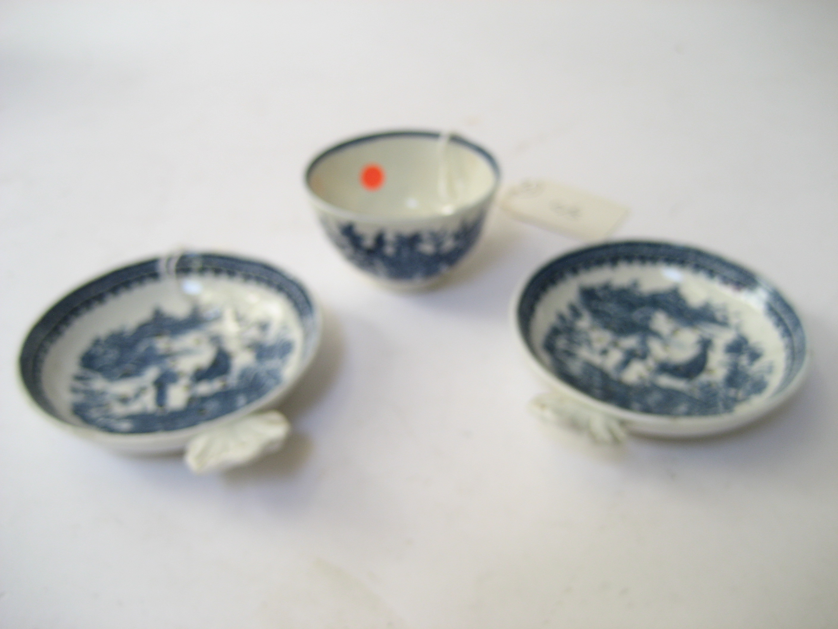 Appraisal: A PAIR OF CAUGHLEY PORCELAIN STRAINERS of plain circular form