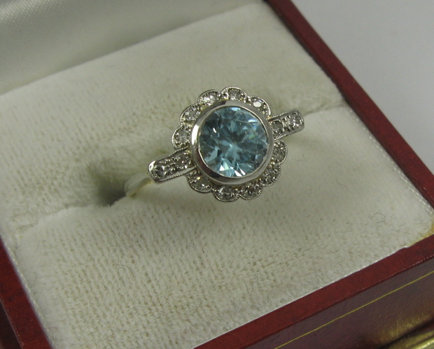 Appraisal: BLUE ZIRCON DIAMOND PLATINUM AND K GOLD RING centering a